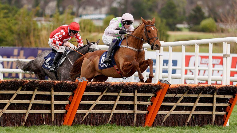 DUBLIN, IRELAND - FEBRUARY 05: Paul Townend riding Vauban (pink) clear the last to win The Racing TV '12 Per Month This Weekend Only' Spring Juvenile Hurdle from Davy Russell and Fil Dor (red) at Leopardstown Racecourse on February 05, 2022 in Dublin, Ire