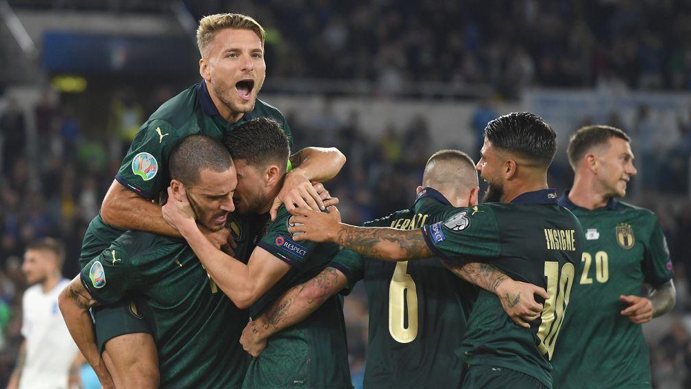 Italy celebrate Jorginho's goal during October's qualifying win over Greece