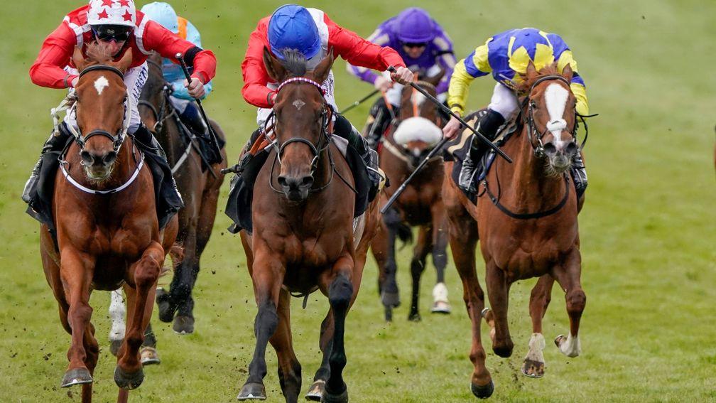 Sacred (centre) wins the Nell Gwyn Stakes on her return to action
