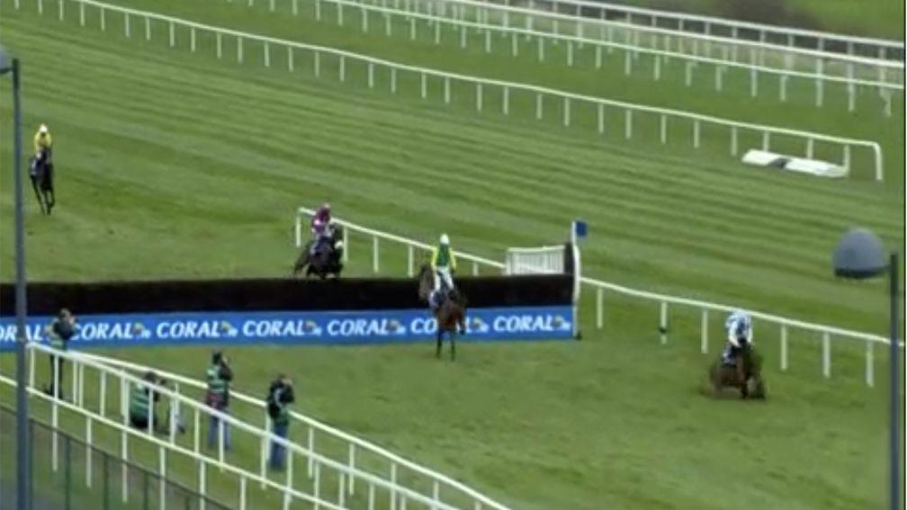 Killultagh Vic slithers on landing upon jumping the last, with Walsh managing to sit tight