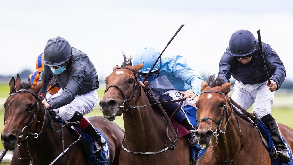 Divinely (right) comes out on top in the Flame of Tara Stakes at the Curragh