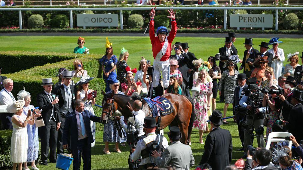 Frankie Dettori celebrates with a flying dismount from Inspiral after winning the Coronation Stakes