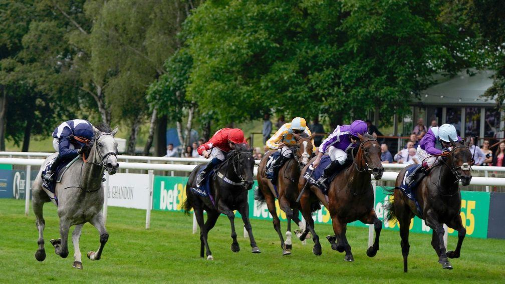 Snow Lantern (far left) powers to victory over Mother Earth (purple cap) and Alcohol Free (right of picture) in the Tattersalls Falmouth Stakes at Newmarket