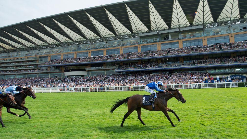 Paul Hanagan celebrates after Taghrooda's King George VI and Queen Elizabeth Stakes victory in 2014