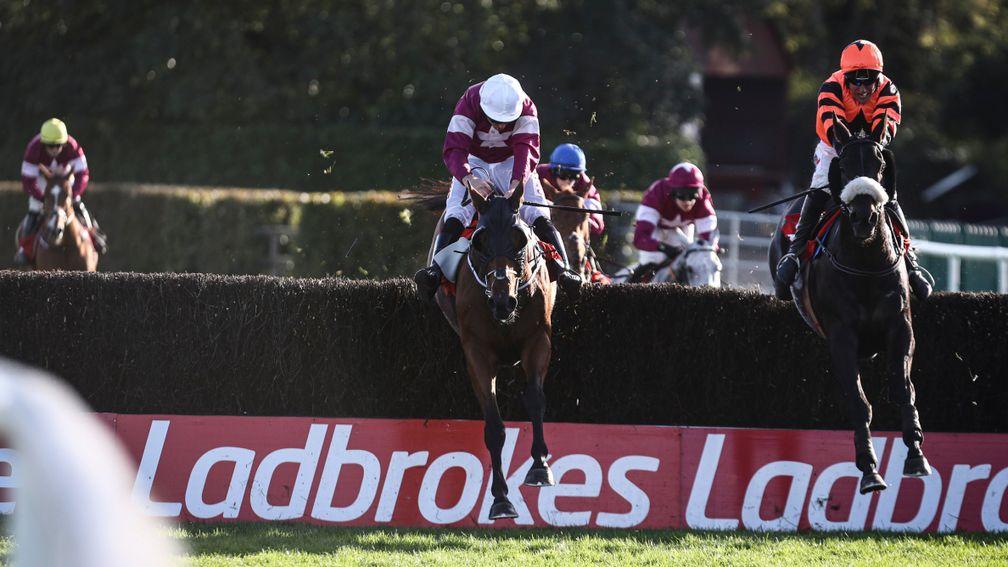 Jett (right) jumps the last with Alpha Des Obeaux at Punchestown