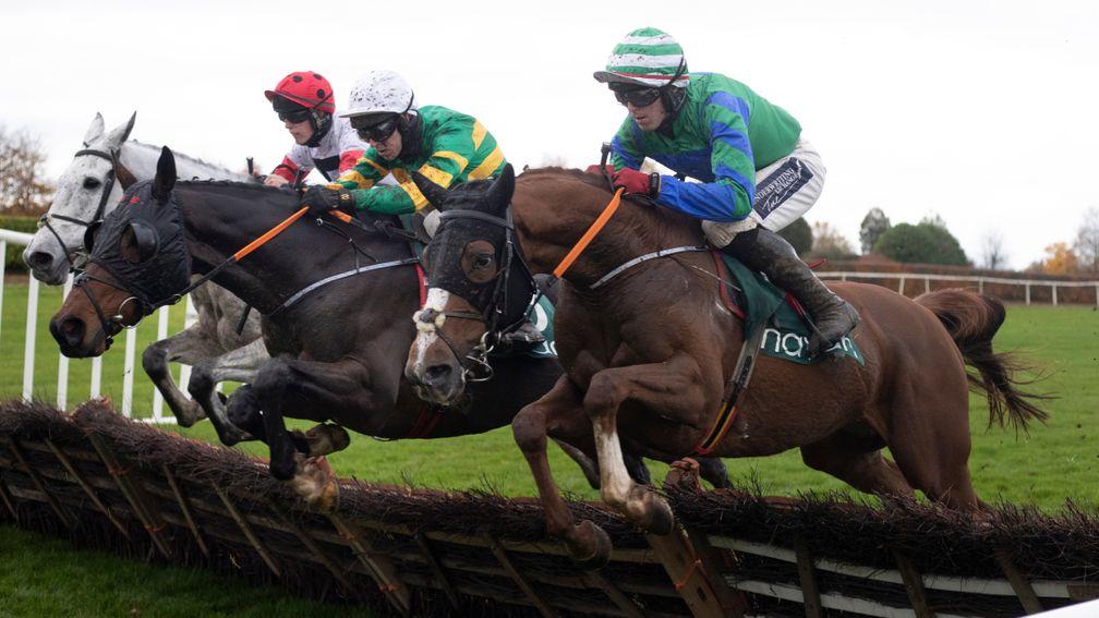 Sire Du Berlais and Mark Walsh (centre) jump a hurdle on their way to victory in the Lismullen Hurdle at Navan