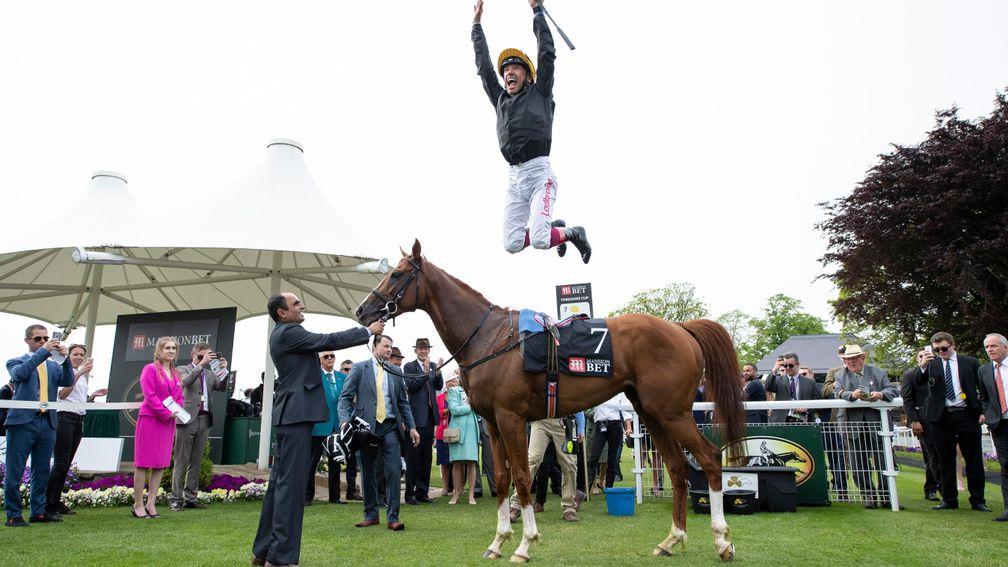 Flying Frankie: Frankie Dettori does his customary flying dismount after Stradivarius's win in the Yorkshire Cup