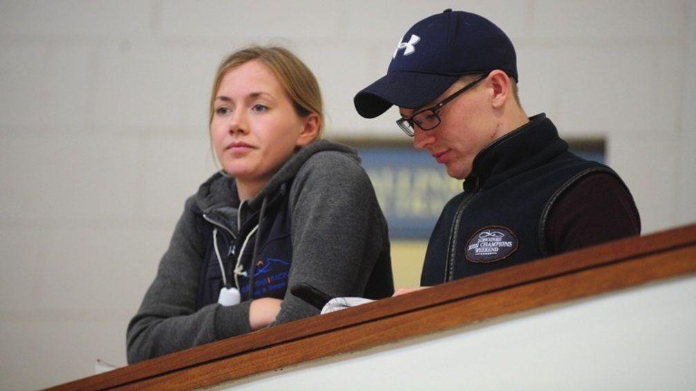 Kerri Lyons and Colin Keane pay close attention on the action at the sales