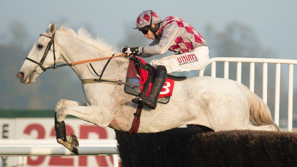 Smad Place and Wayne Hutchinson jump the final fence to score at Kempton