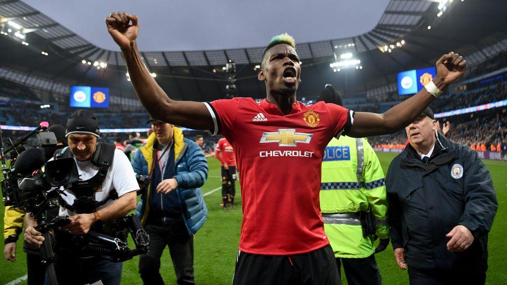 Paul Pogba celebrates Manchester United's dramatic 3-2 win over rivals City last term