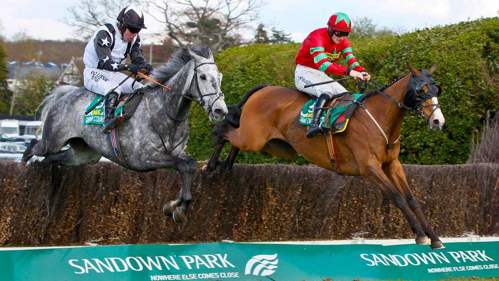 Quentin Collonges and Andrew Tinkler (left) fly the last before going on to win the bet365 Gold Cup in 2013