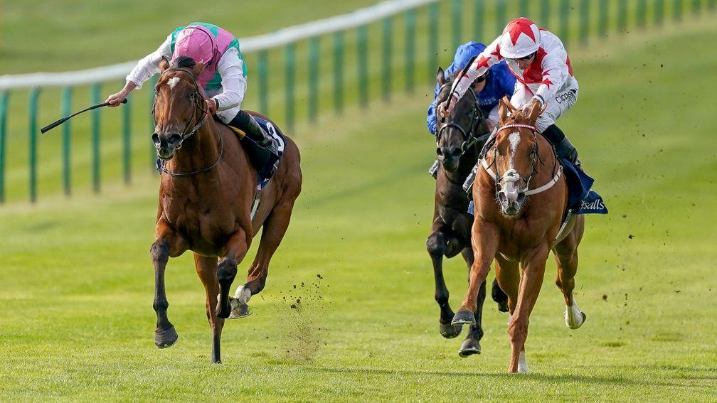 NEWMARKET, ENGLAND - SEPTEMBER 22: Ryan Moore riding Nostrum (L) win The Tattersalls Stakes at Newmarket Racecourse on September 22, 2022 in Newmarket, England. (Photo by Alan Crowhurst/Getty Images)