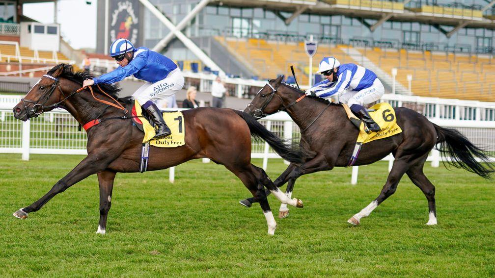 Alkumait (1) strides to success in the Group 2 Dubai Duty Free Mill Reef Stakes at Newbury