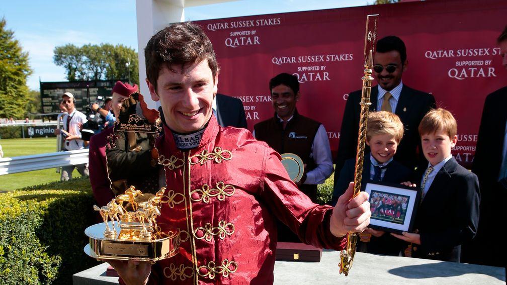 Oisin Murphy with the trophies for the Sussex Stakes