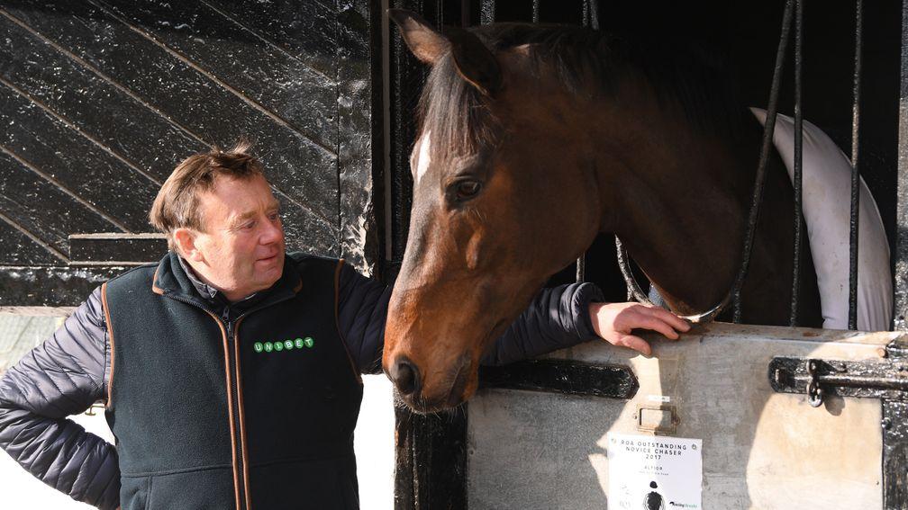 Nicky Henderson with Altior, who is unbeaten in 15 starts over hurdles and fences