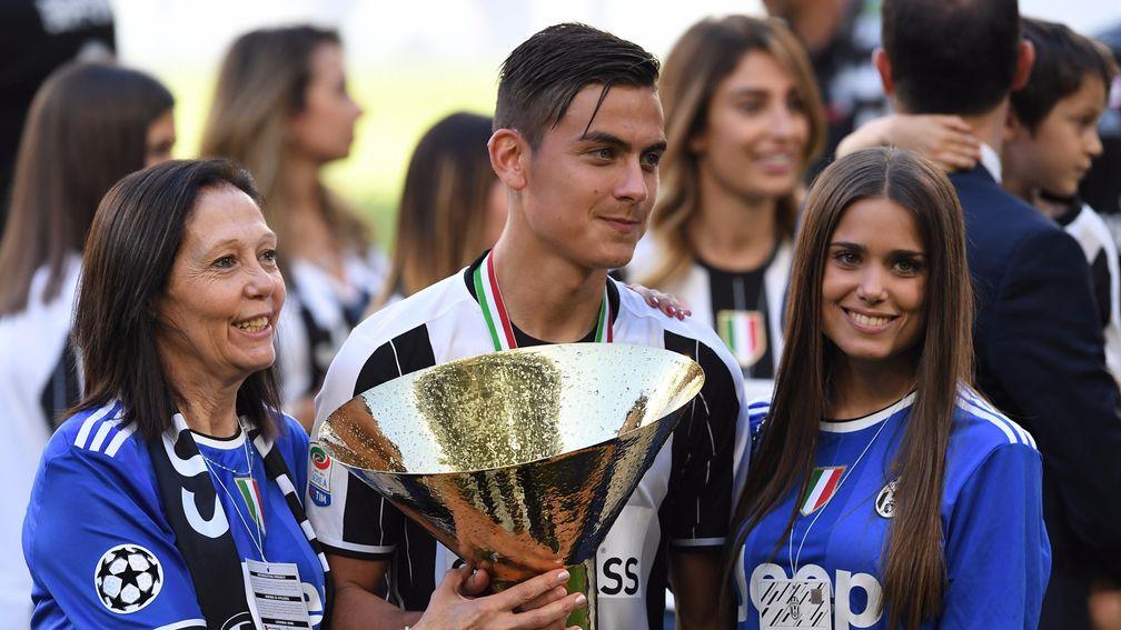 Paulo Dybala celebrates Juve being crowned Serie A champions