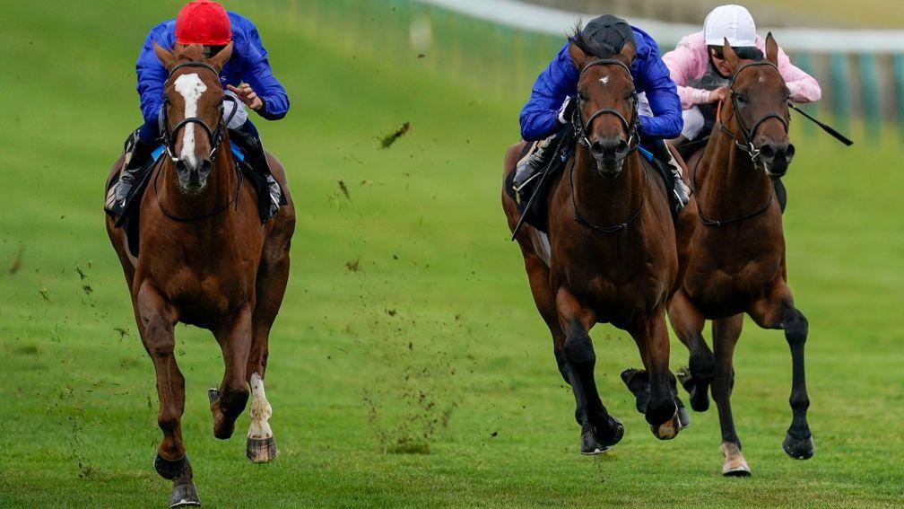 Modern News (red cap) gets the better of stablemate Noble Dynasty (black cap) at Newmarket