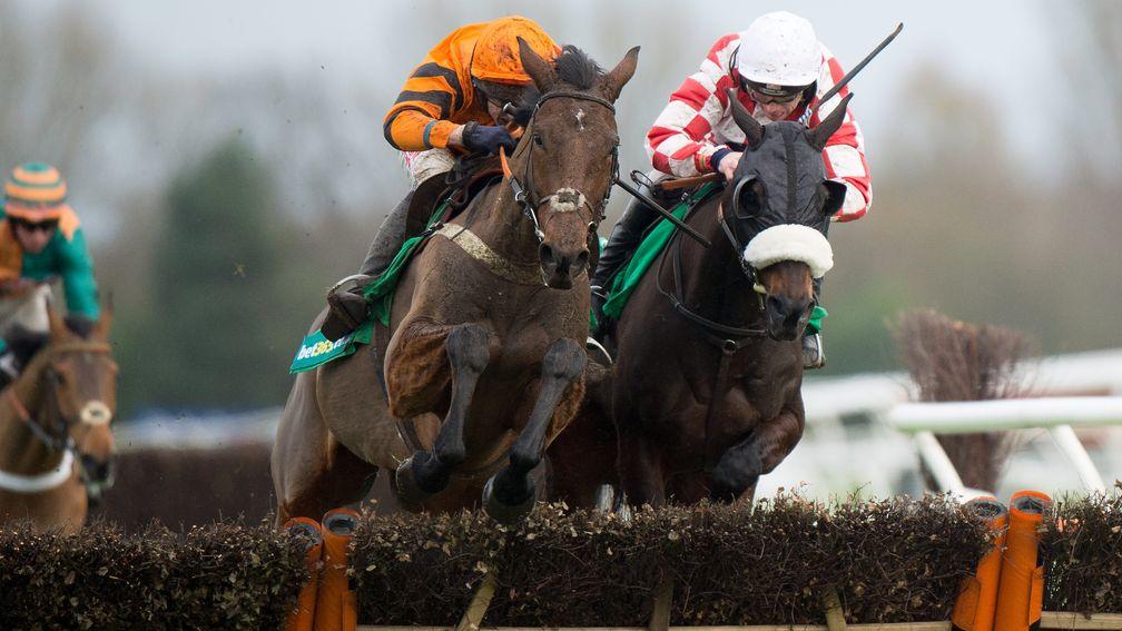 Thistlecrack (Tom Scudamore, left) jumps the final flight with Deputy Dan before pulling clear for a six-length success in the 2015 Long Distance Hurdle at Newbury