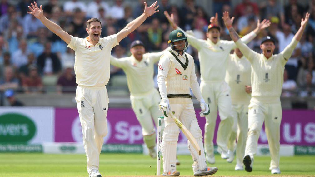 Chris Woakes claims the wicket of Usman Khawaja in Australia's first innings at Edgbaston