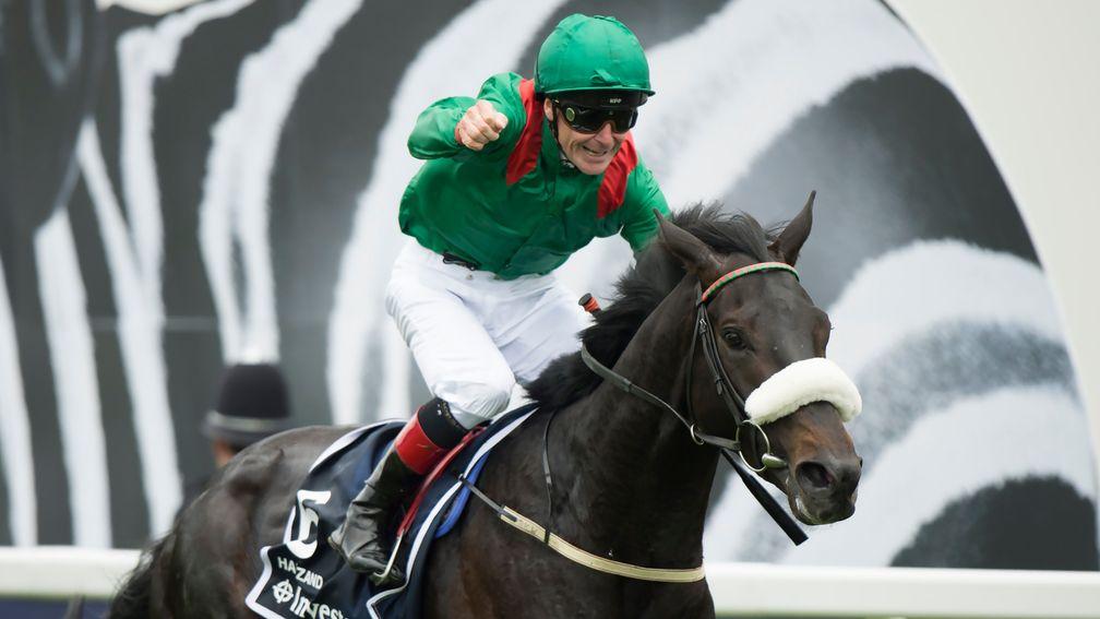 Pat Smullen punches the air as he wins the 2016 Investec Derby on Harzand
