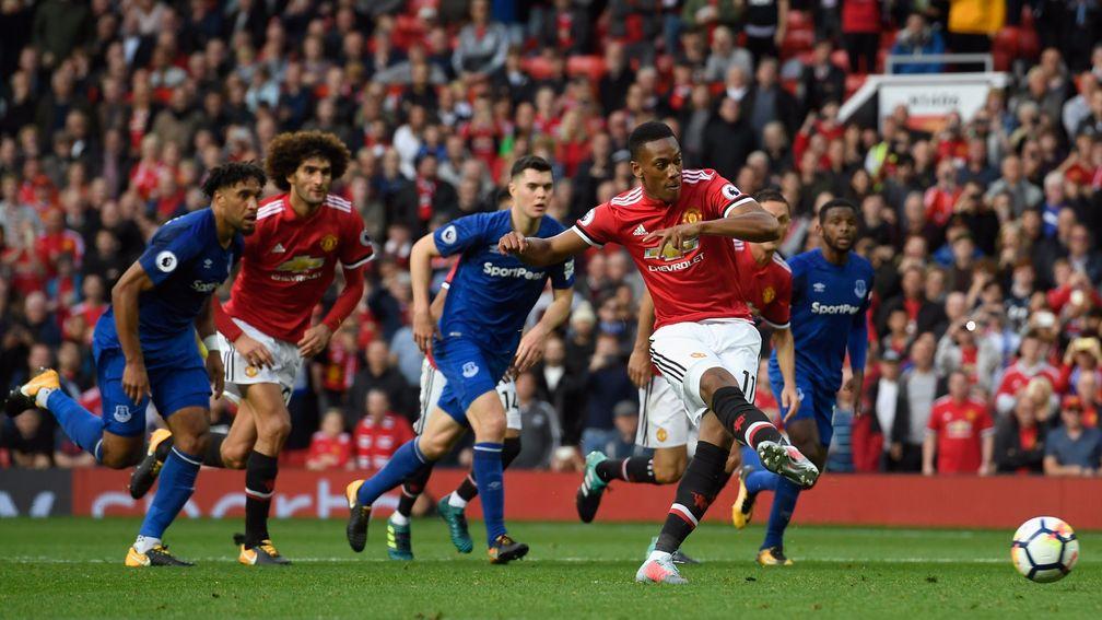 Anthony Martial scores from the spot against Everton