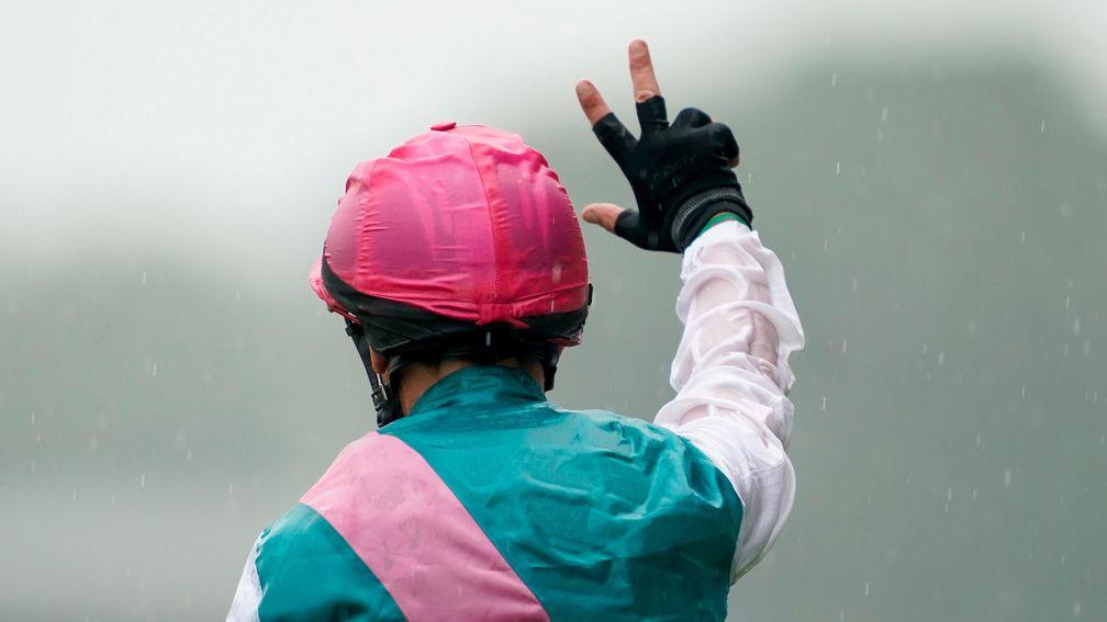 ASCOT, ENGLAND - JULY 25: Frankie Dettori signals three after riding Enable to win her third The King George VI And Queen Elizabeth Qipco Stakes at Ascot Racecourse on July 25, 2020 in Ascot, England. Owners are allowed to attend if they have a runner at