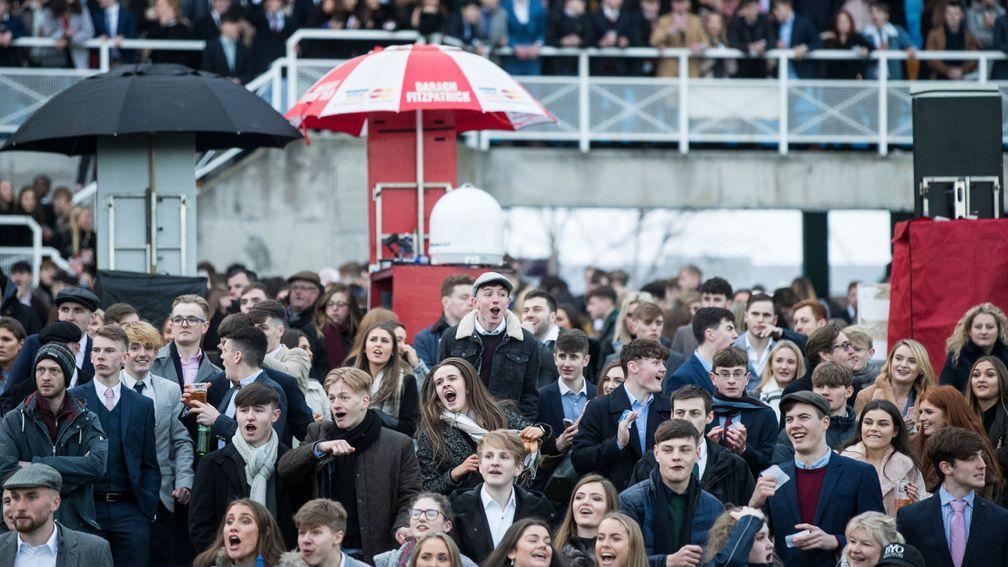 Leopardstown crowd eagerly watch the action unfold