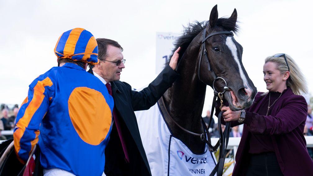 Aidan O'Brien, jockey Ryan Moore and groom Aine Murphy with Auguste Rodin after the Vertem Futurity Stakes