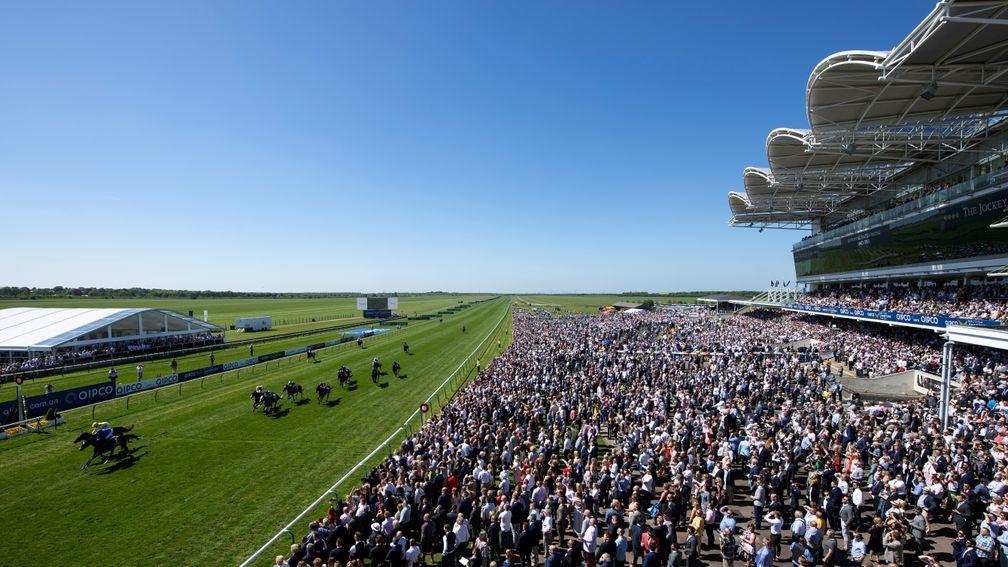 Packed crowds watch the action on Newmarket's Rowley Mile