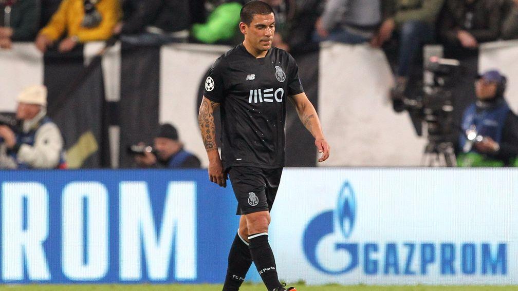Porto defender Maxi Pereira trudges off afte receiving a red card