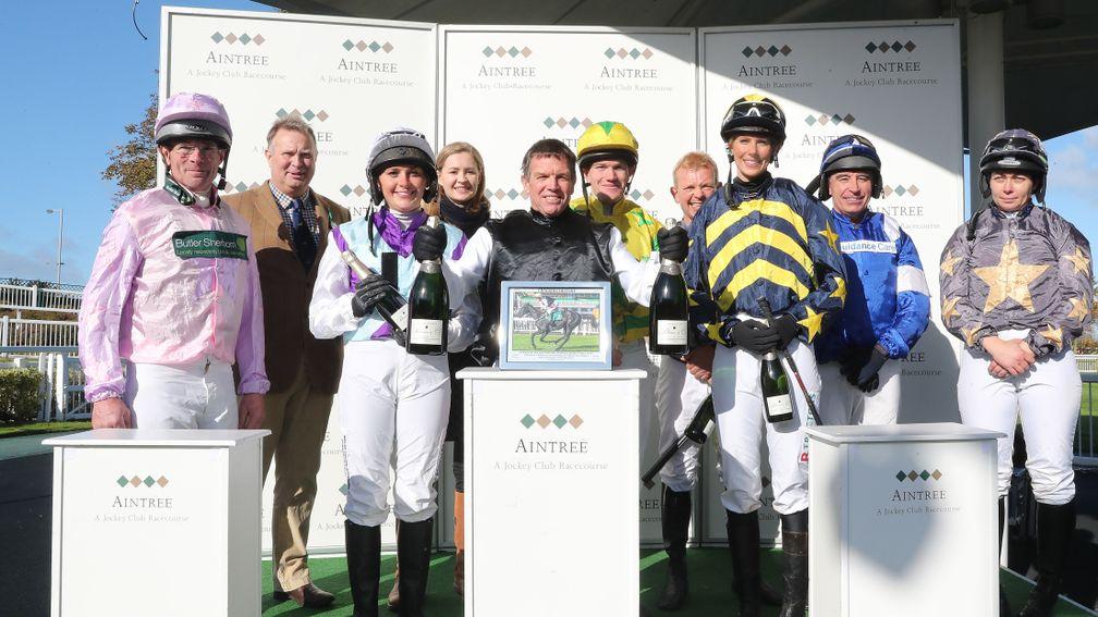 Runners and riders all smiles after completing the Aintree charity race