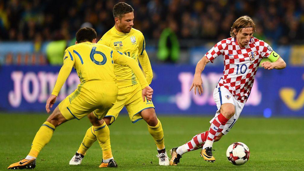 Luka Modric (right) is a class act in midfield for Croatia