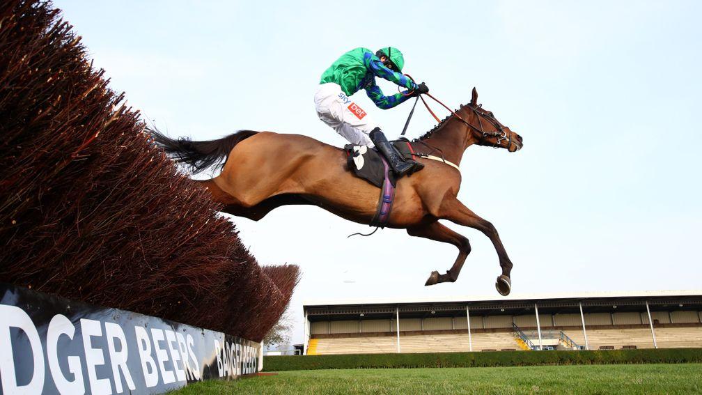 WINCANTON, ENGLAND - NOVEMBER 07:   Daryl Jacob on board Ga Law jump on their way to victory during the 'Rising Stars' Novices' Chase at Wincanton Racecourse on November 7, 2020 in Wincanton, England. (Photo by Michael Steele/Getty Images)
