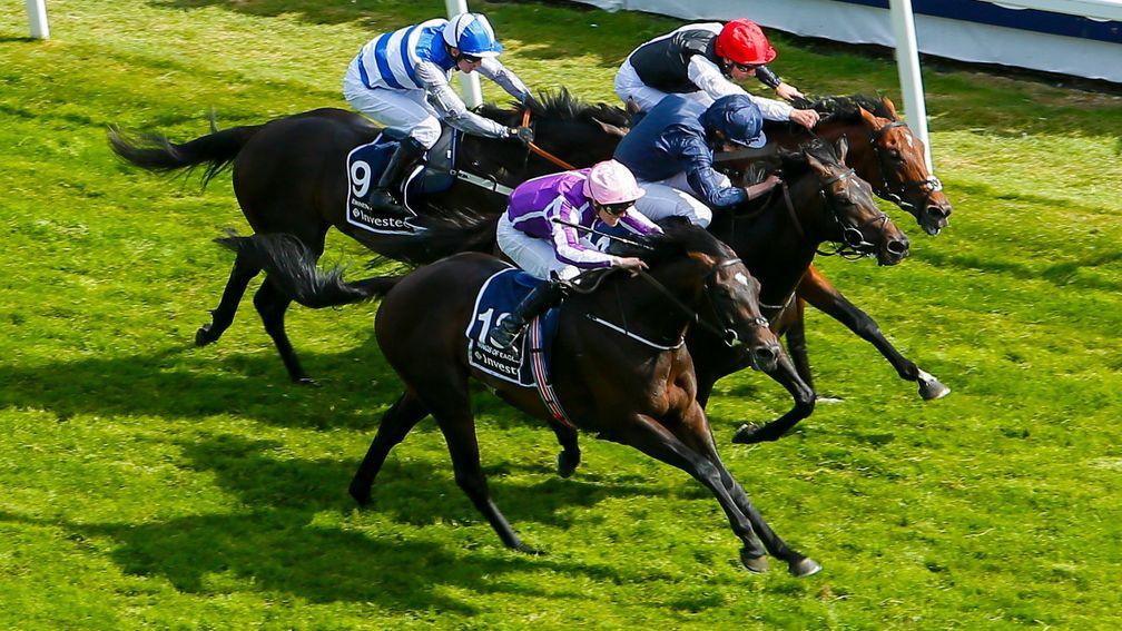 Eminent and Jim Crowley (left, hooped colours) finishing fourth in the Derby at Epsom on Saturday
