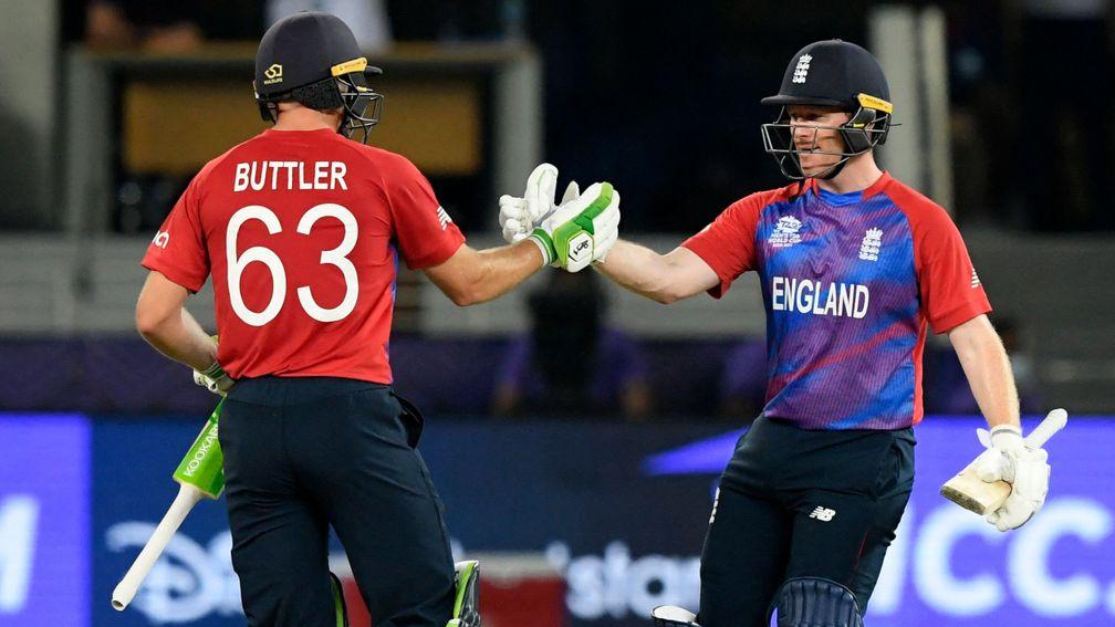 Jos Buttler and Eoin Morgan celebrate England's win over the West Indies