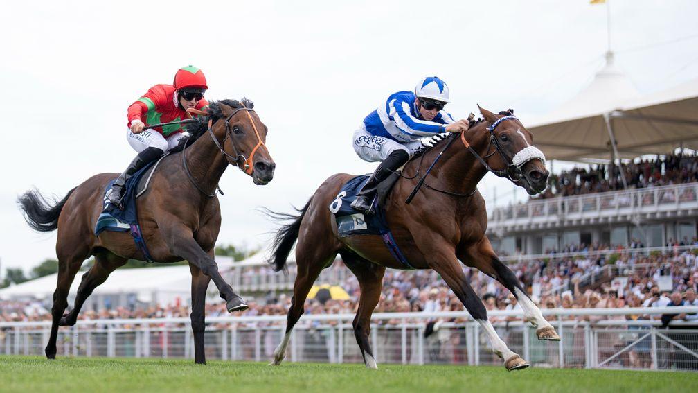 The Foxes (David Probert,right) beats Classic (Pat Dobbs) in the 7f maidenGoodwood 30.7.22 Pic: Edward Whitaker