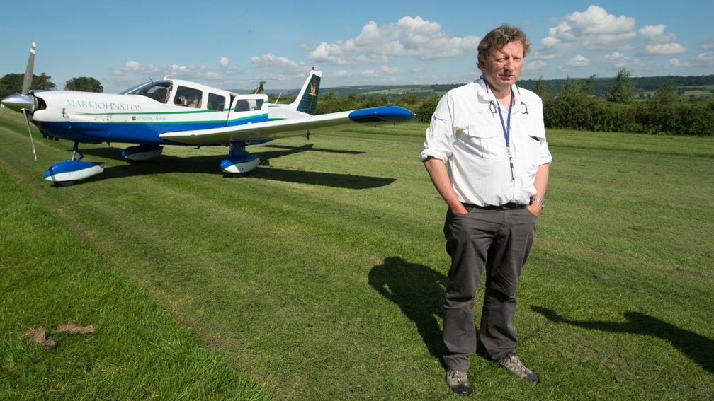 Middleham trainer and registered pilot Mark Johnston with his Cessna aeroplane