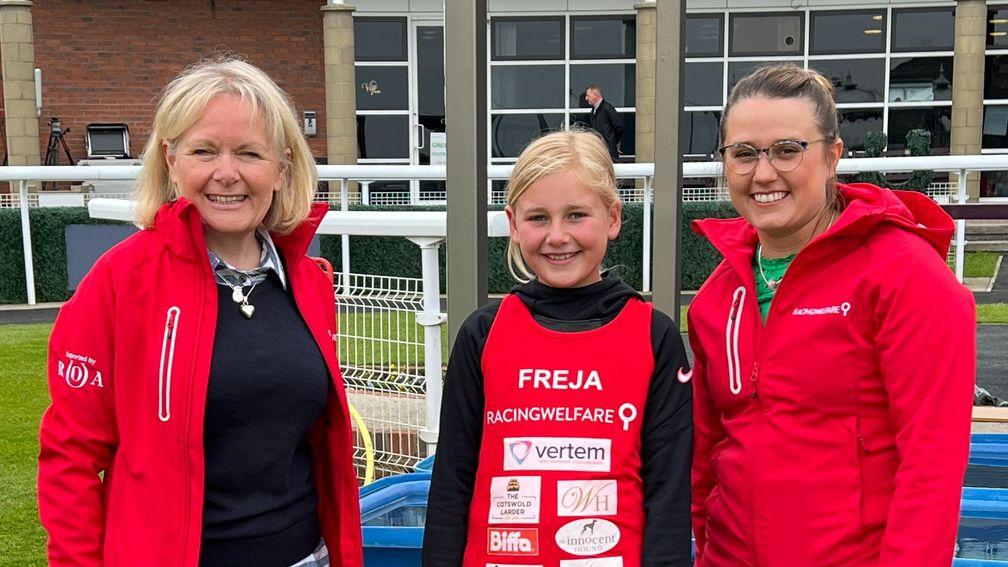 Freja Thackray with Racing Welfare Welfare officers Sarah Monkman (left)and Harriet McHugh.