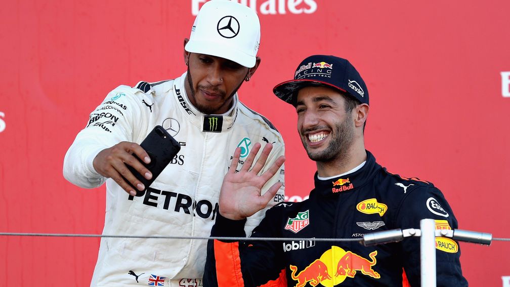Lewis Hamilton (left) snaps a selfie with Red Bull's Daniel Ricciardo