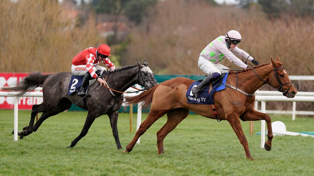 DUBLIN, IRELAND - FEBRUARY 05: Paul Townend riding Vauban (pink) clear the last to win The Racing TV '12 Per Month This Weekend Only' Spring Juvenile Hurdle from Davy Russell and Fil Dor (red) at Leopardstown Racecourse on February 05, 2022 in Dublin, Ire