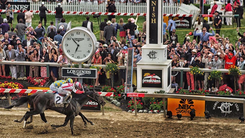 Cloud Computing nails Classic Empire in the shadow of the post to win the Preakness Stakes; he clashes again with Always Dreaming, who was only eighth at Pimlico