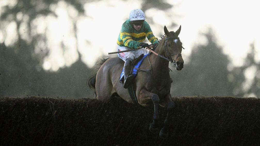 EXETER, ENGLAND - DECEMBER 07: Defi Du Seuil ridden by Barry Geraghty jump the last on their way to winning the Heavitree Brewery PLC Novices Chase at Exeter Racecourse on December 7, 2018 in Exeter, England. (Photo by Harry Trump/Getty Images)