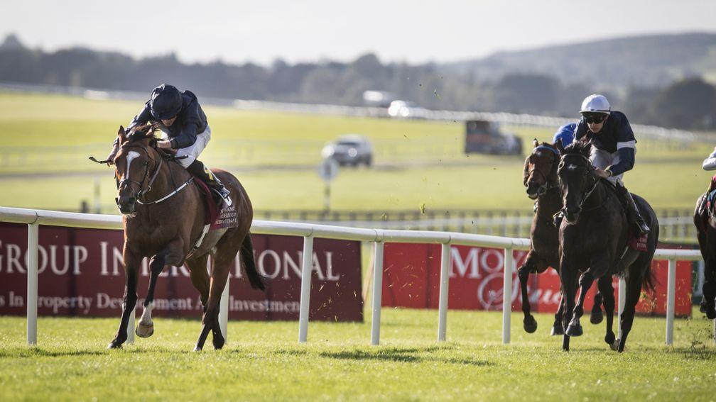 Flag Of Honour is clear of Latrobe (white cap) in the Irish St Leger at the Curragh