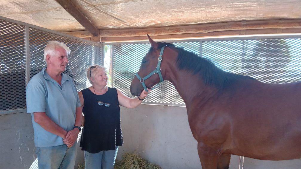 Walter and Fran Cowe inspect one of their star yearlings