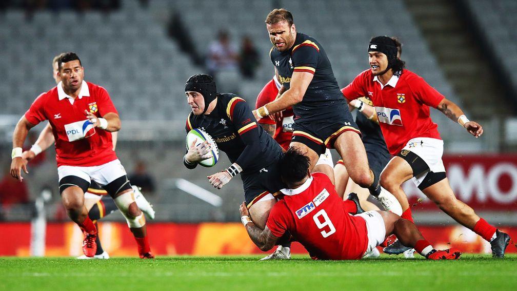 Sam Davies is tackled as he tries to make a break against Tonga