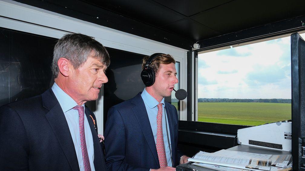 Simon and Ed Crisford prepare to call the second race at Newmarket