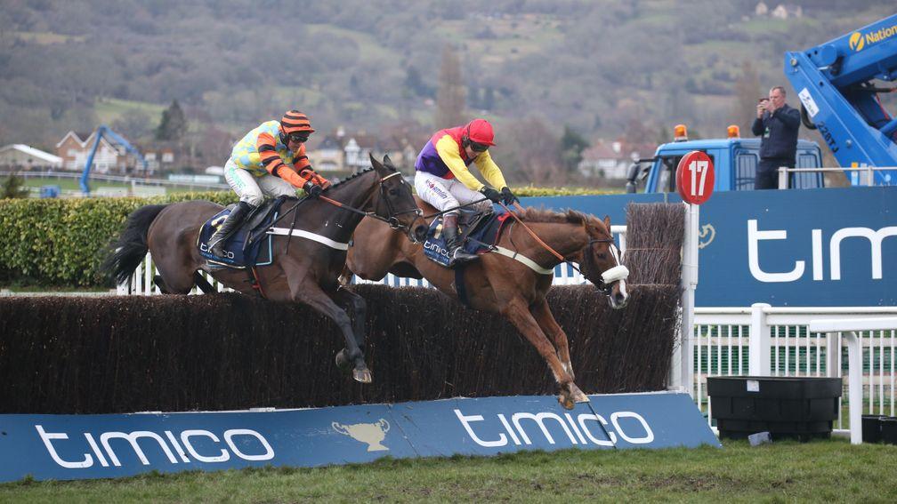 Native River (Richard Johnson, far side) jumps past Might Bite at the last on the way to winning the 2018 Gold Cup