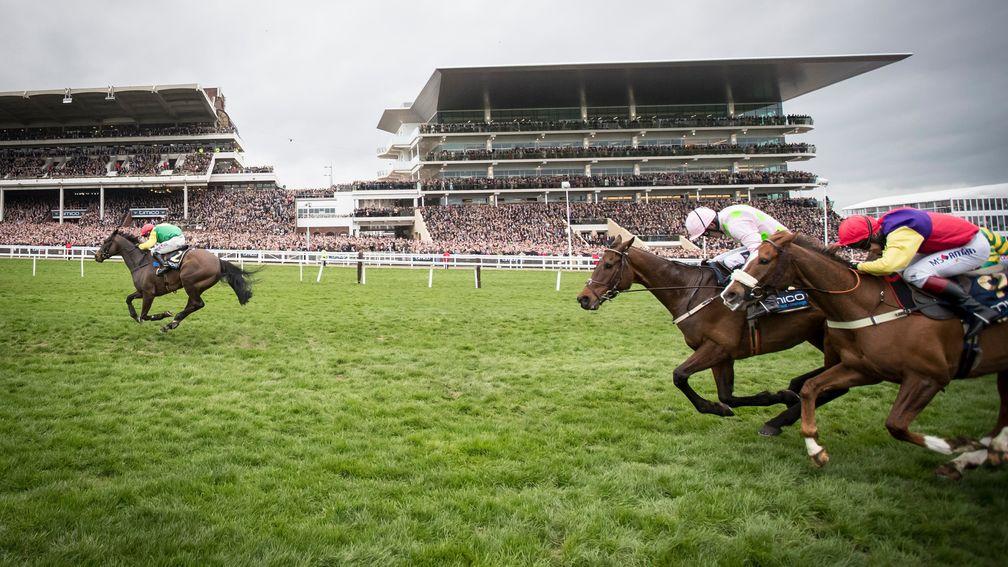 Sizing John clears away from Djakadam (second right) in the Cheltenham Gold Cup