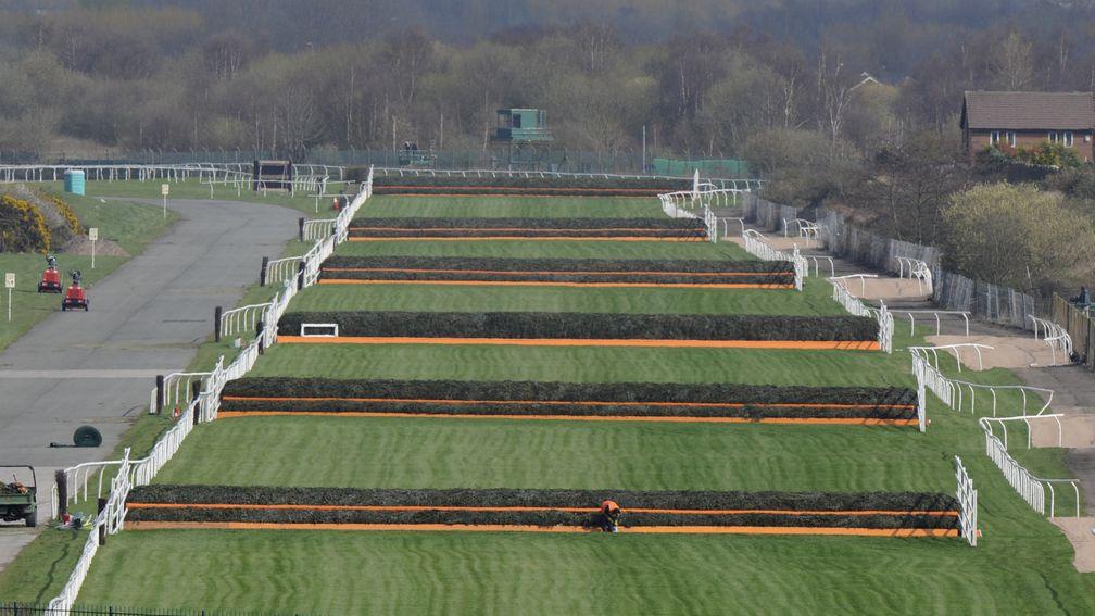 Aintree's Grand National course: jockeys will have to walk the track if they have not ridden over these fences twice