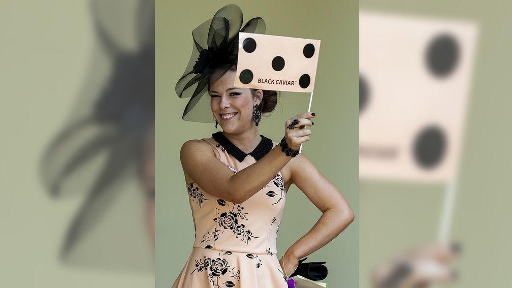 A Black Caviar fan provides a racing shot and a fashion shot all in one